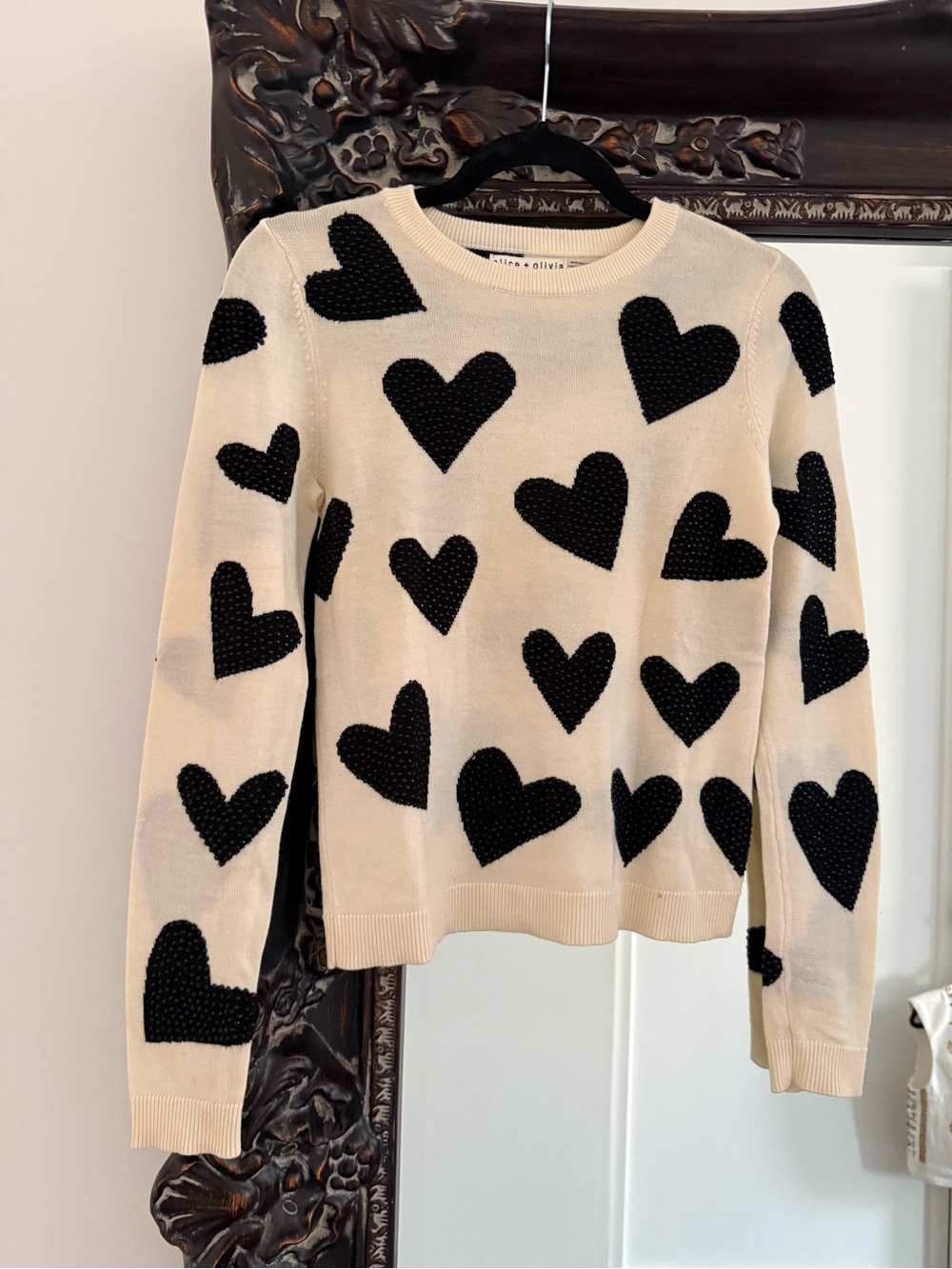 Alice + Olivia Cream Crewneck Sweater with Black Heart Appliqués